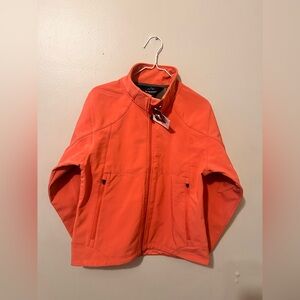 Tri-Mountain women's polyester softshell jacket in coral/salmon color and size M